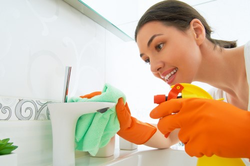 Professional cleaner treating drapes in a Chelsea property